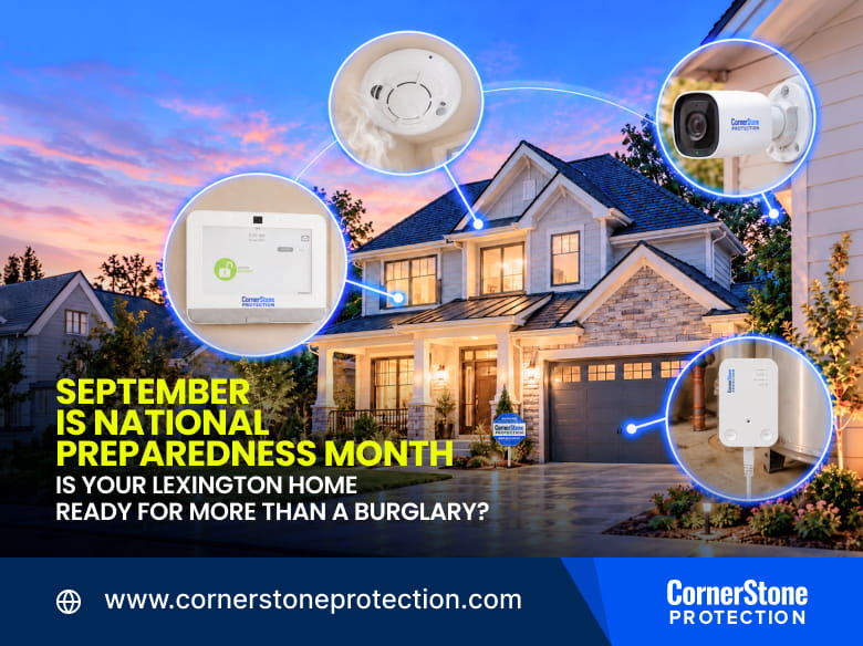 Person holding smartphone with home security app notification during National Preparedness Month